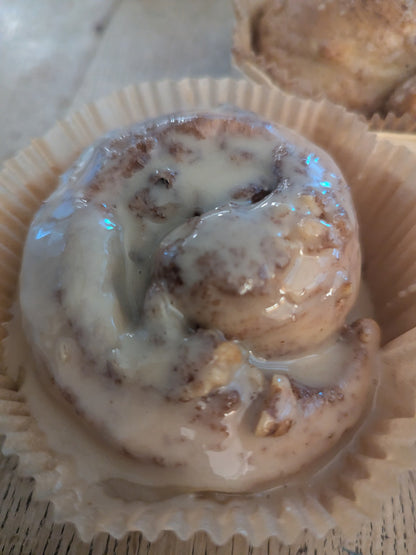 Walnut Praline Cinnamon Roll with Vanilla Glaze